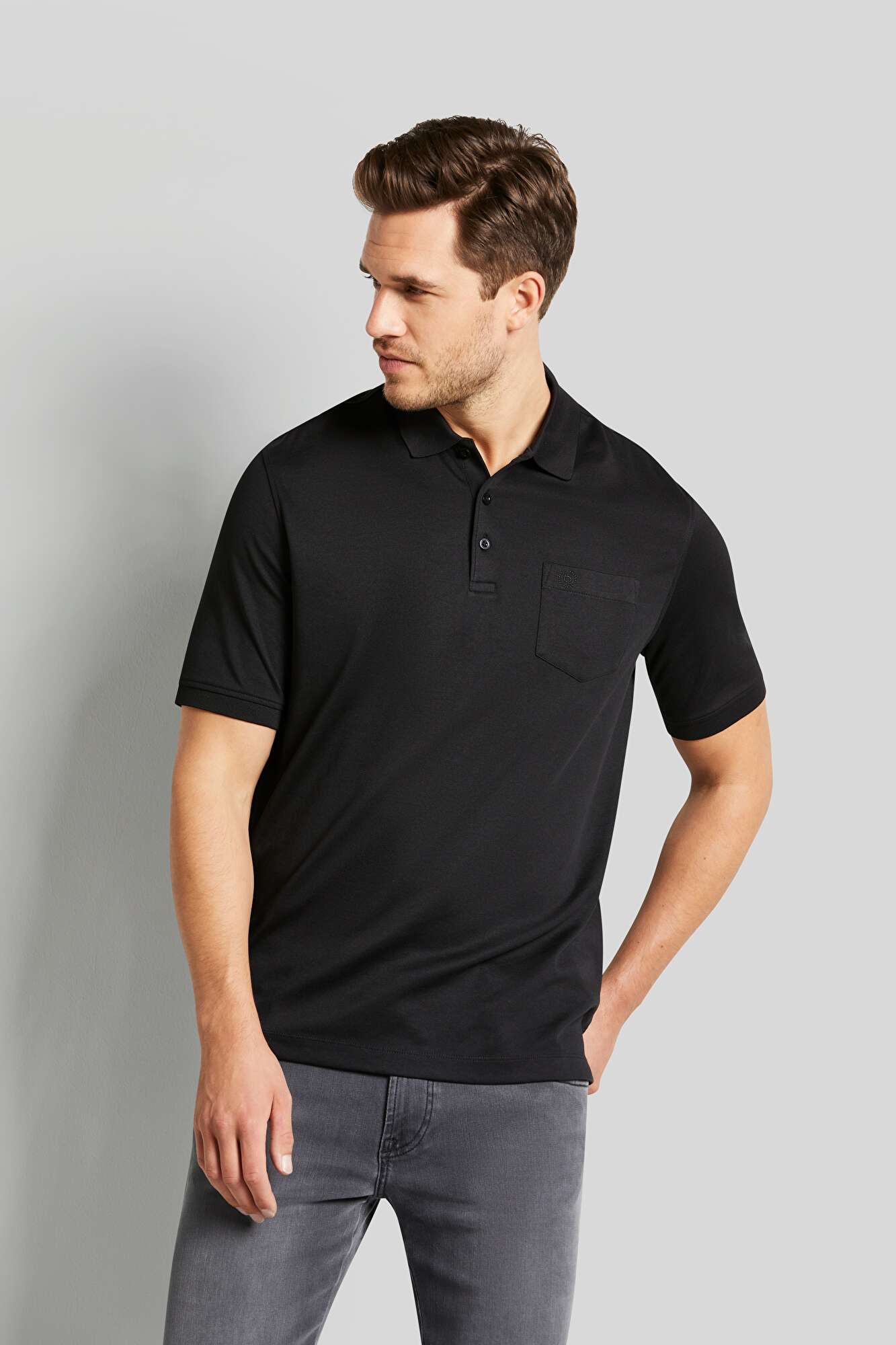 Polohemd besonders soft in schwarz - Ansicht: Model Front