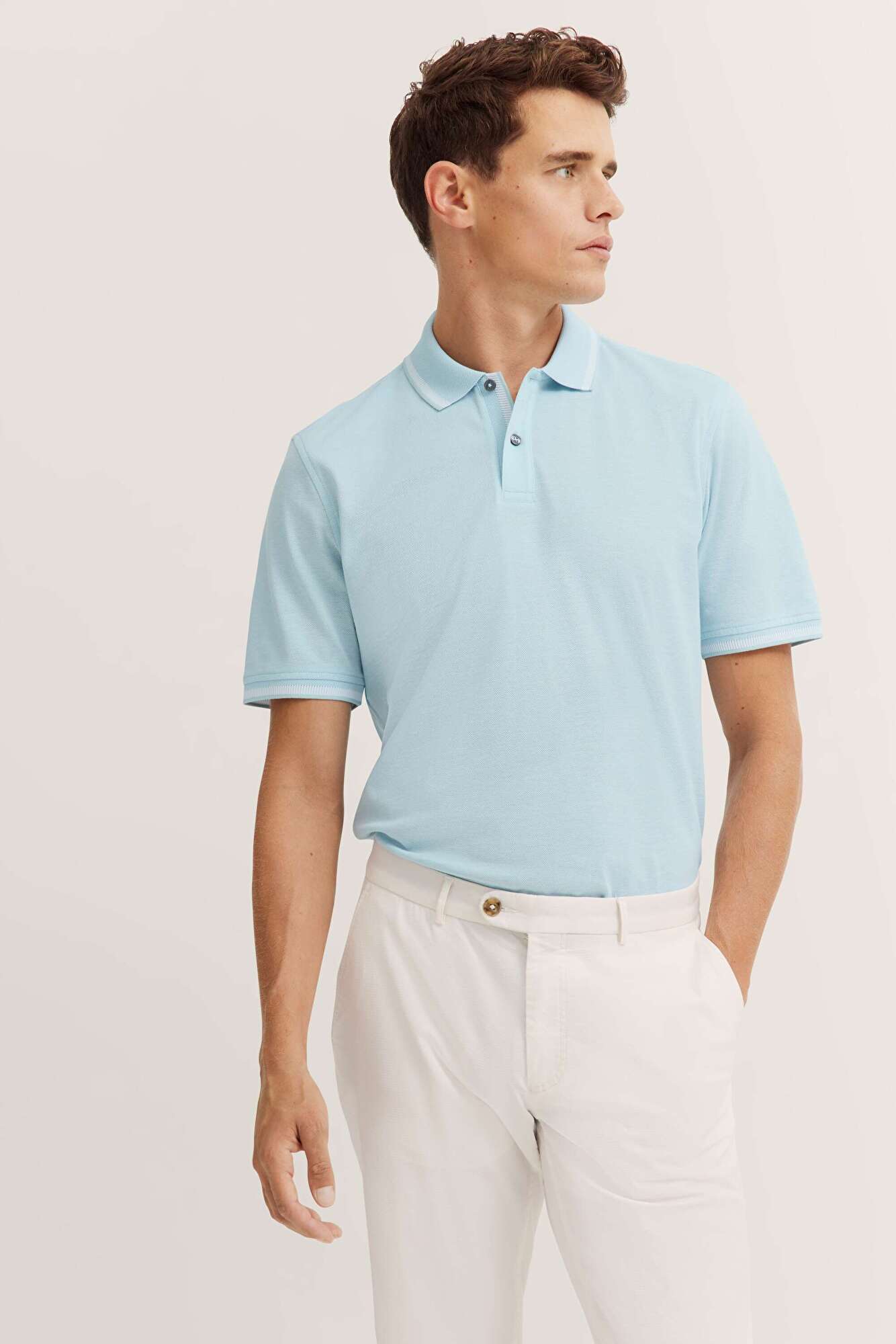 Polo aus Baumwolle in mint - Ansicht: Model Front